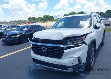 2025 Honda Pilot Touring from USA, damaged, VIN 5FNYG2H77SB029169